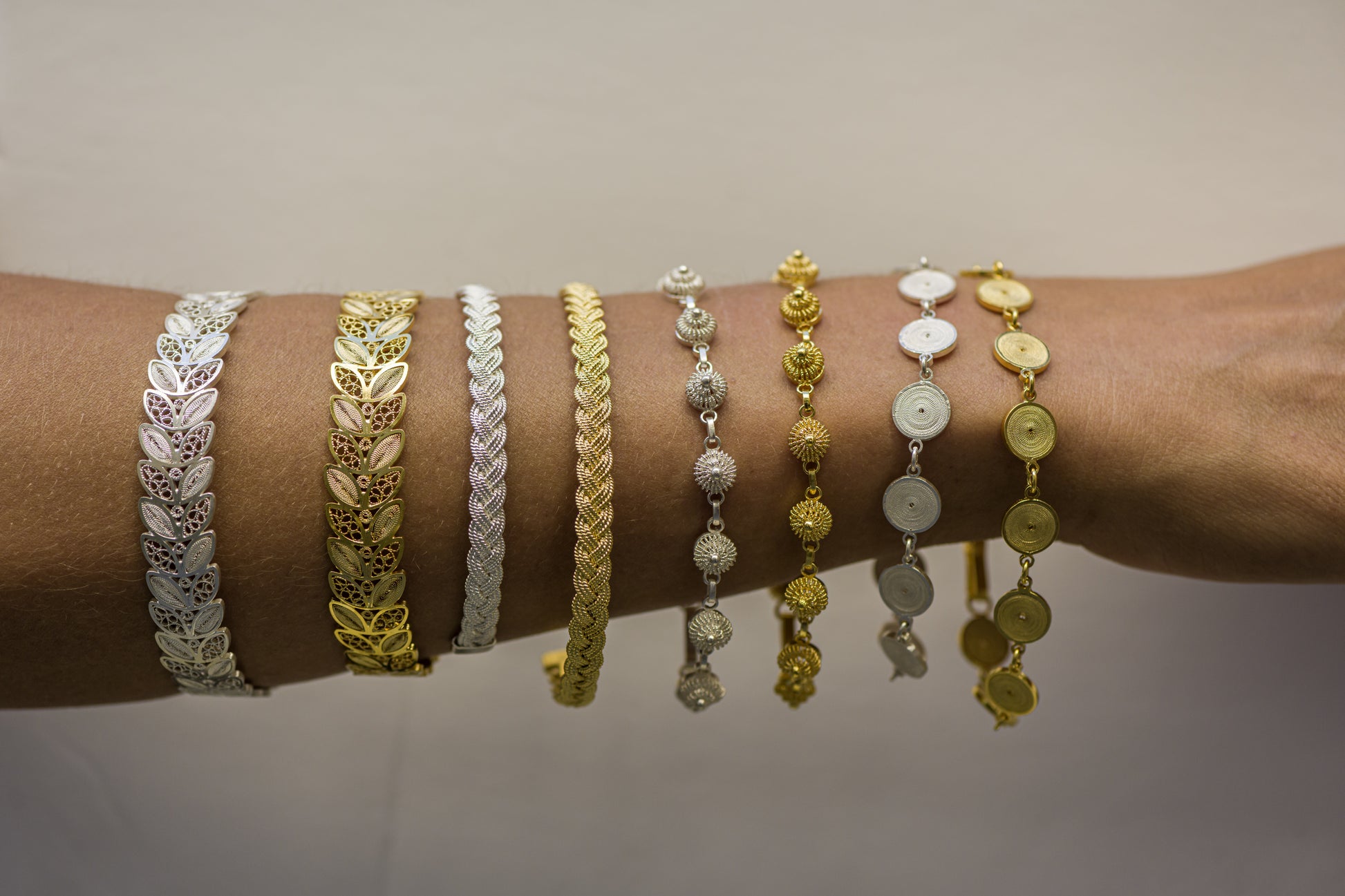 All the Oh Voila Bracelets on one hand