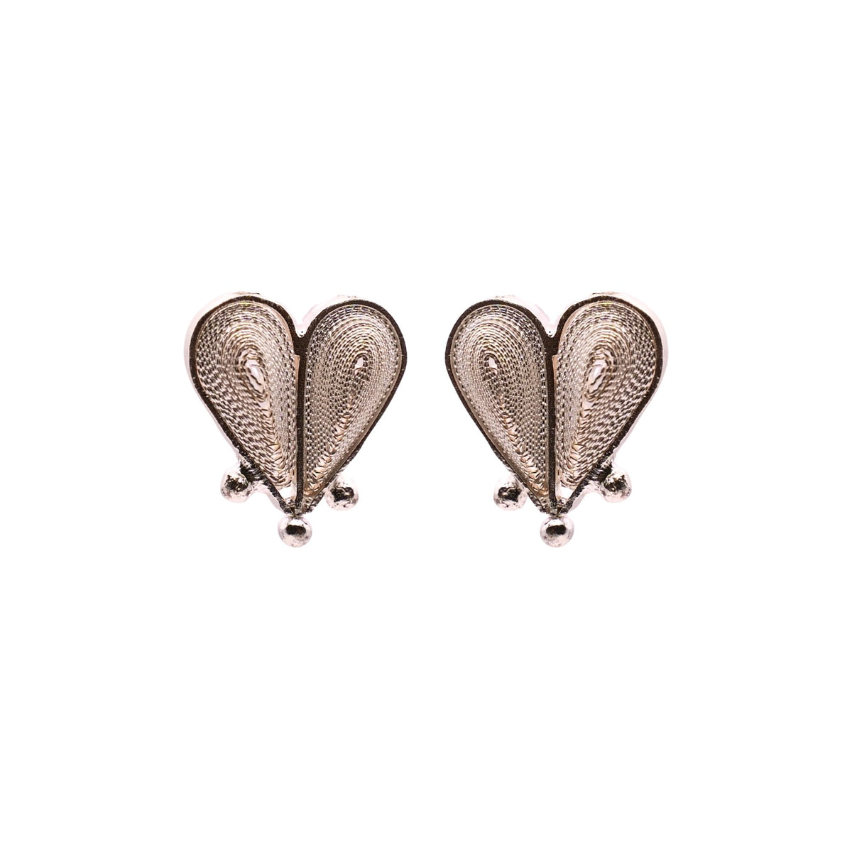 Heart-shaped earrings on a white background