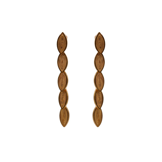 Pair of gold leaf-shaped earrings on a white background